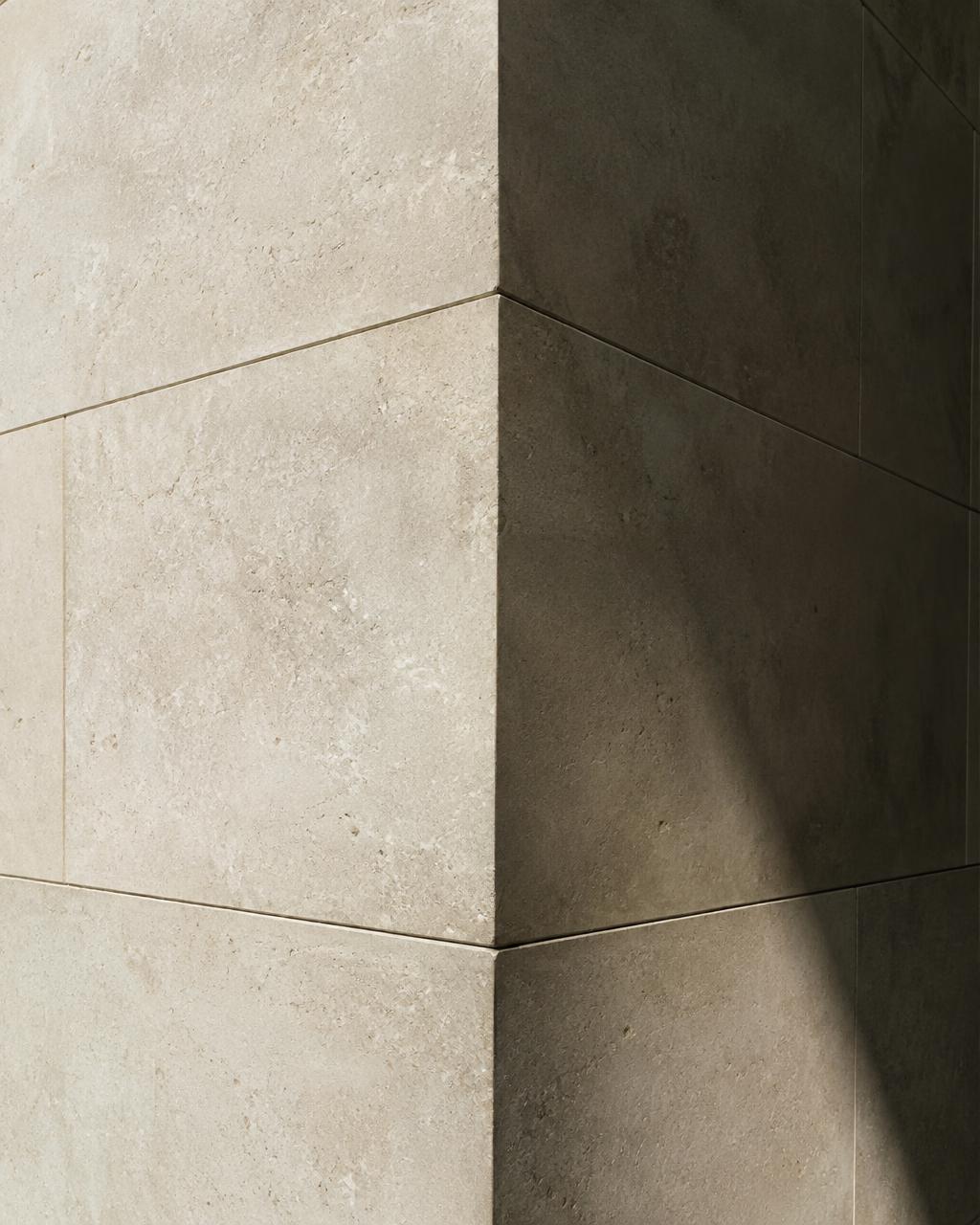 Honed limestone corner in shadow